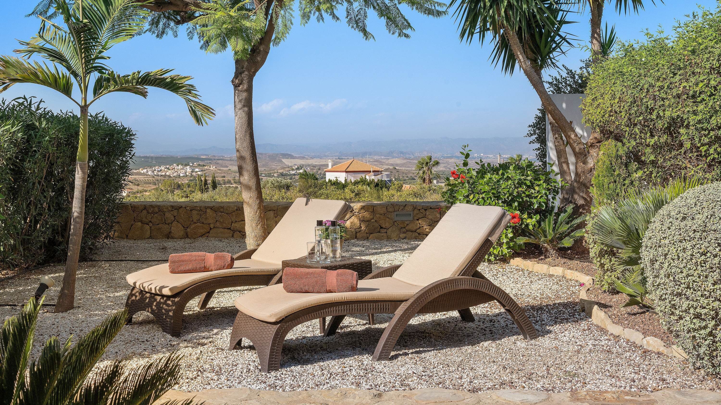 Deluxe Double Room, Lanai, Garden Area | Terrace/patio
