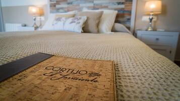 Premium bedding, down duvets, memory-foam beds, in-room safe