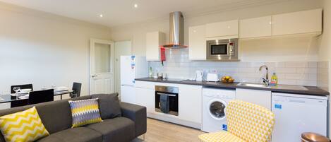 Luxury Studio, Kitchen, Ground Floor | Private kitchen | Fridge, microwave, oven, stovetop