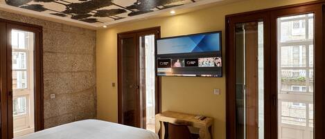 Superior Suite, City View | Minibar, in-room safe, desk, blackout drapes