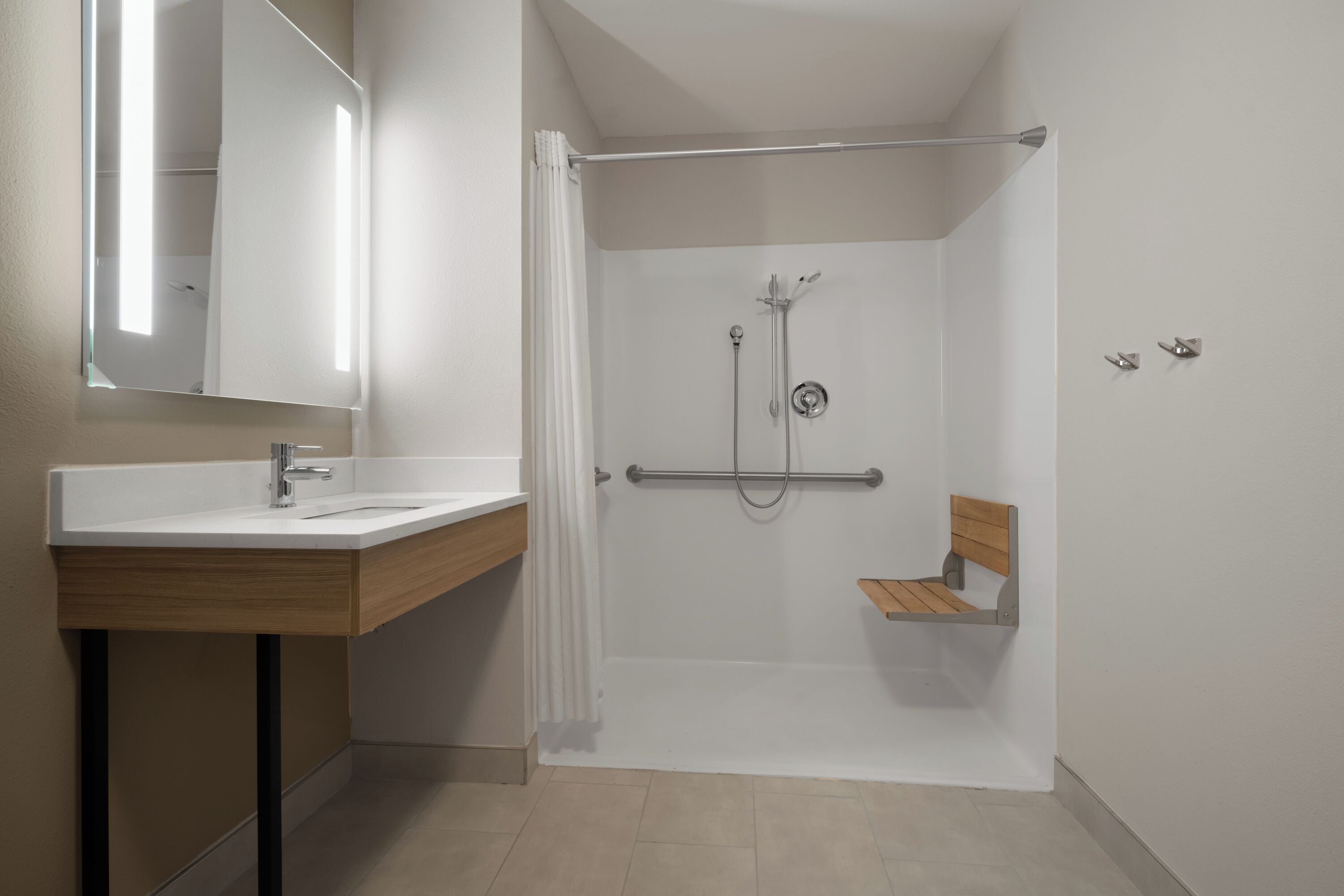 room, 1 king bed, mobility accessible, non smoking (hearing, roll-in shower) | bathroom | shower, free toiletries, hair dryer, towels