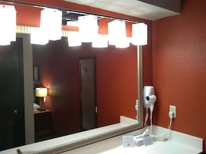 Combined shower/tub, hair dryer, towels, soap