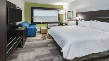 Desk, laptop workspace, blackout drapes, iron/ironing board