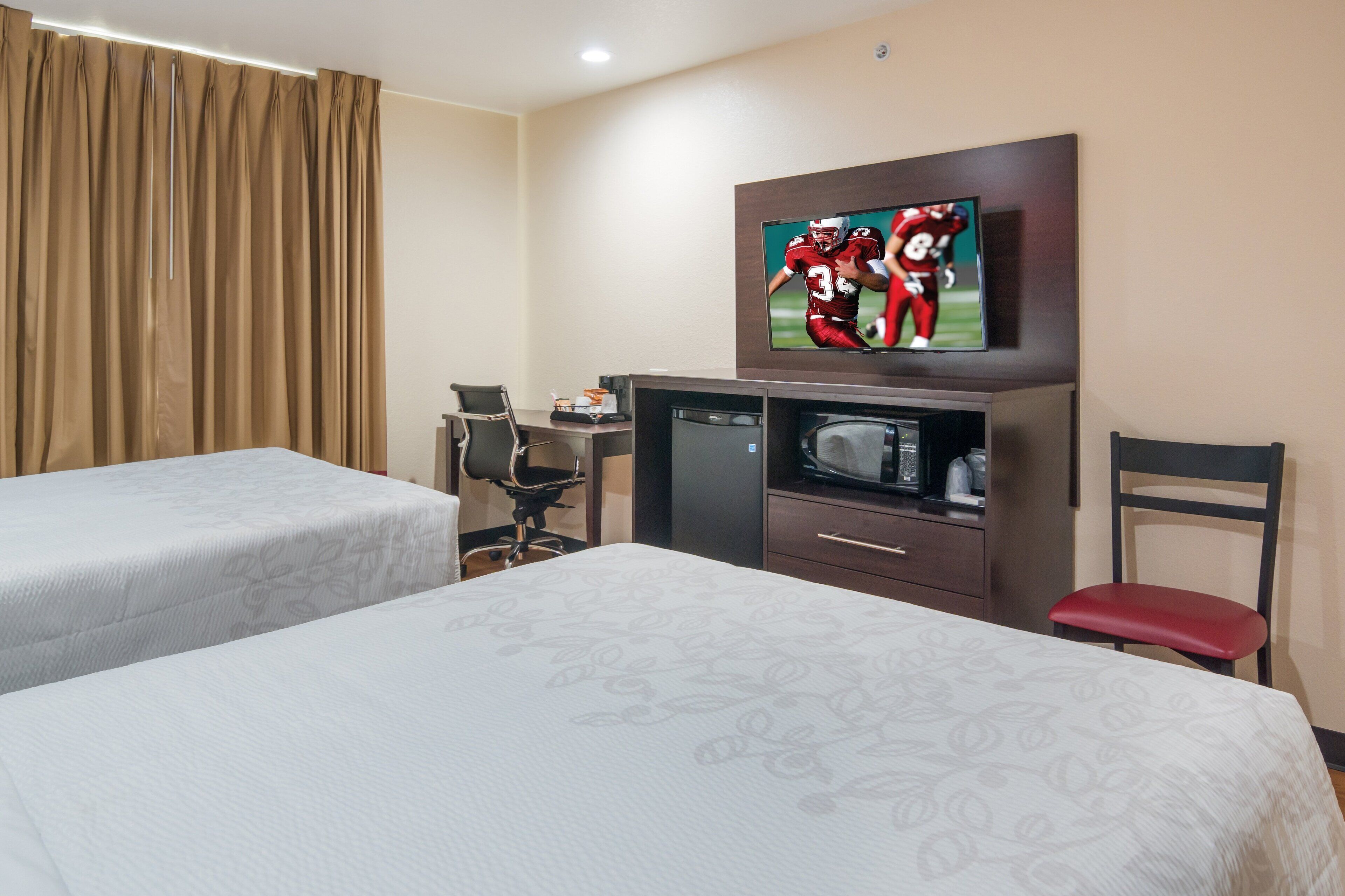 premium bedding, desk, laptop workspace, iron/ironing board