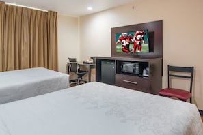 Premium bedding, desk, laptop workspace, iron/ironing board