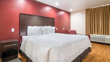 Premium bedding, desk, laptop workspace, iron/ironing board