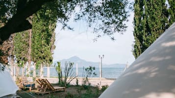 Deluxe Tent, Multiple Beds, Beach View | Terrace/patio