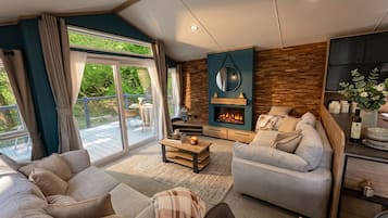 Waterfall Spa Lodge with Hot Tub - No Pets | Living area | 32-inch Smart TV with digital channels, TV, Netflix