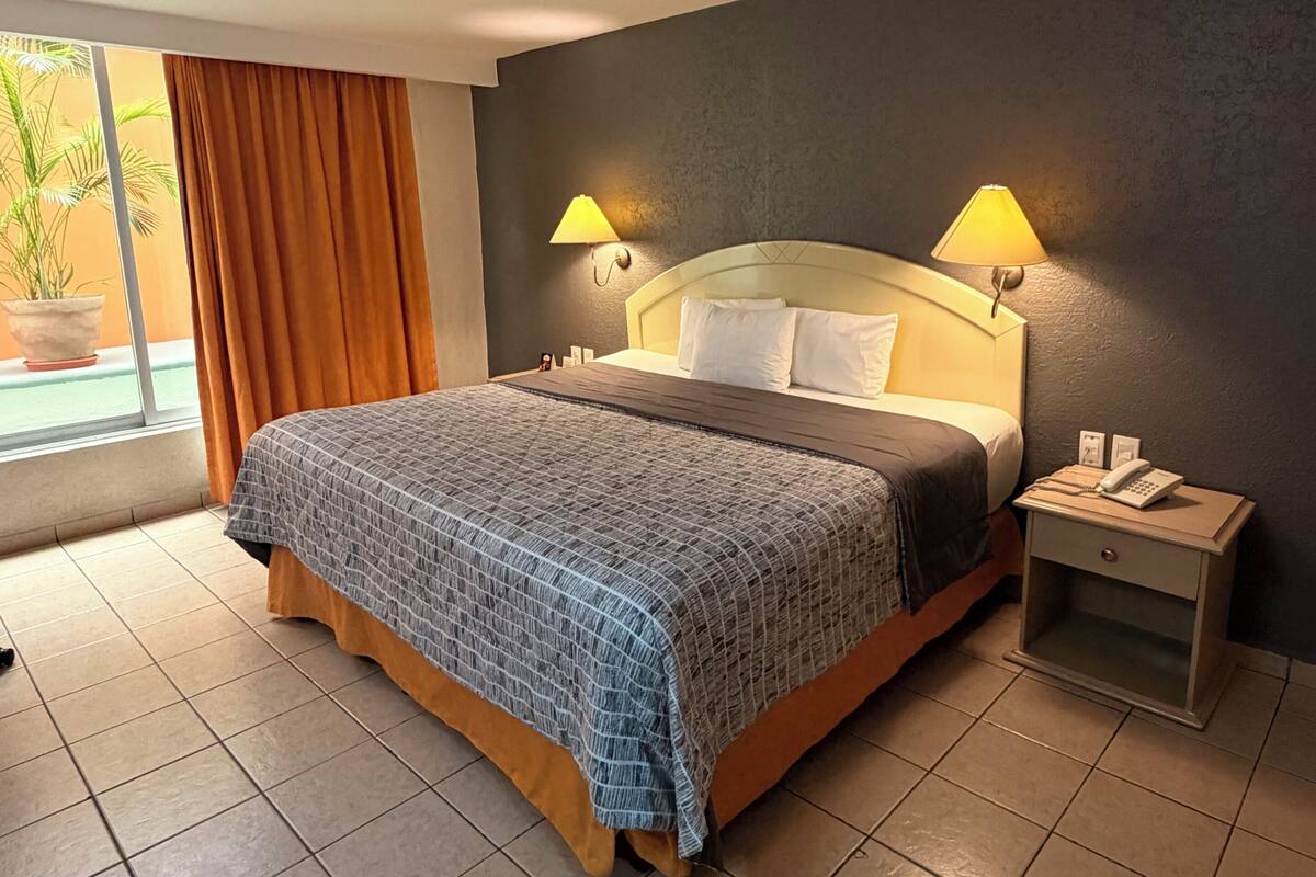 Deluxe Double Room | Premium bedding, in-room safe, desk, laptop workspace