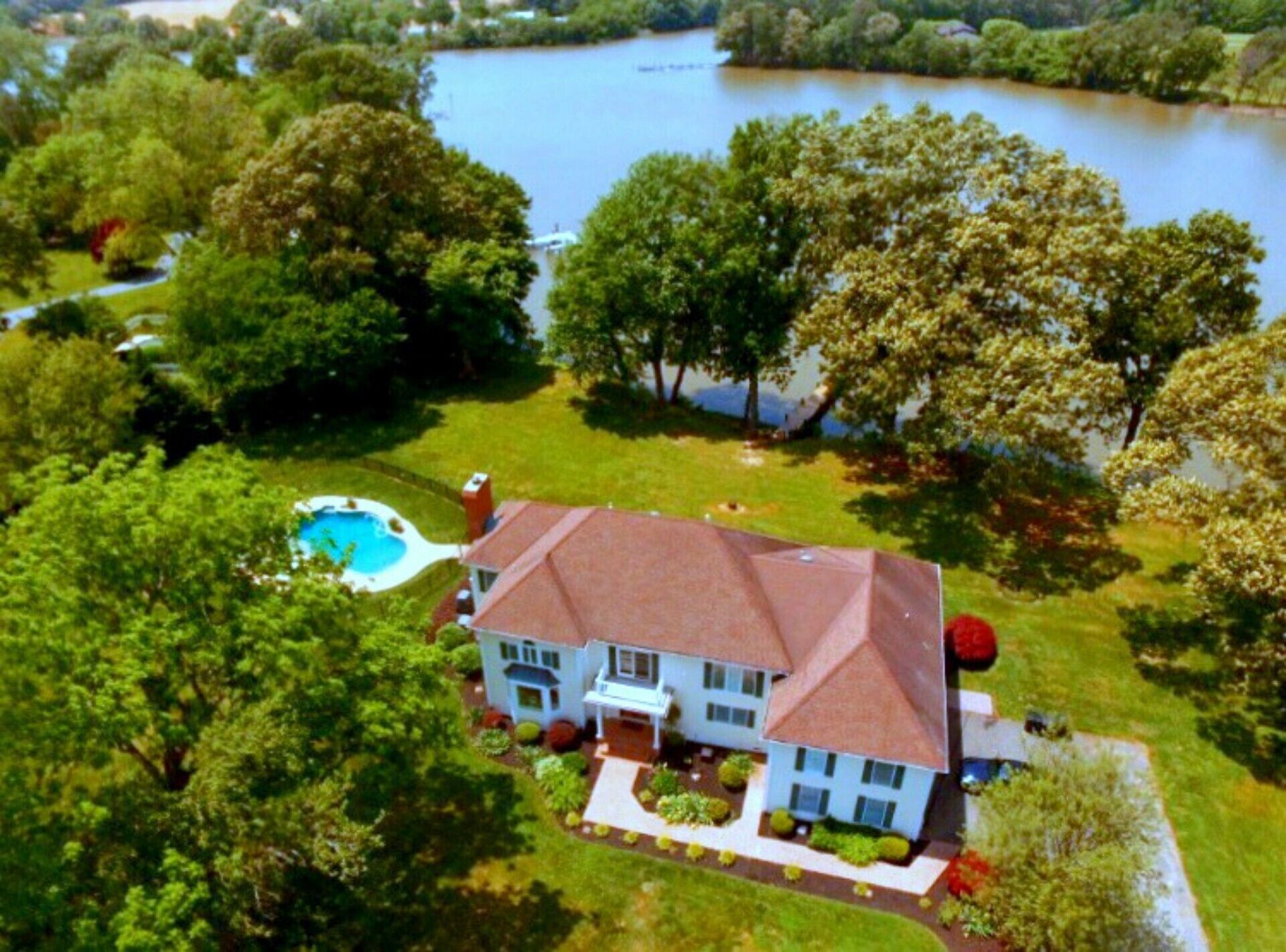 Beautiful, Open floor plan, amazing sunset views,Waterside Pool, Pier, 6+ac