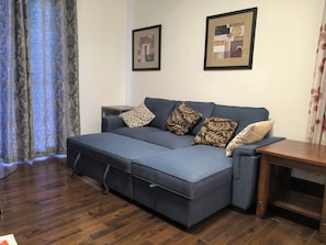 Suite 3- 1 King Bed with Sofa bed, Balcony | Living area | 32-inch LED TV with satellite channels, TV, Netflix - Ambassador's Inn Next Door (Stratford)
