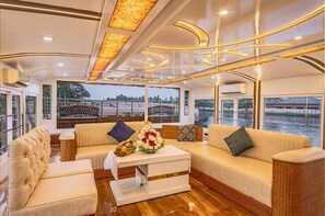 Luxury Double Room, 1 Bedroom, Lake View | Living area | 22-inch TV with cable channels, printers