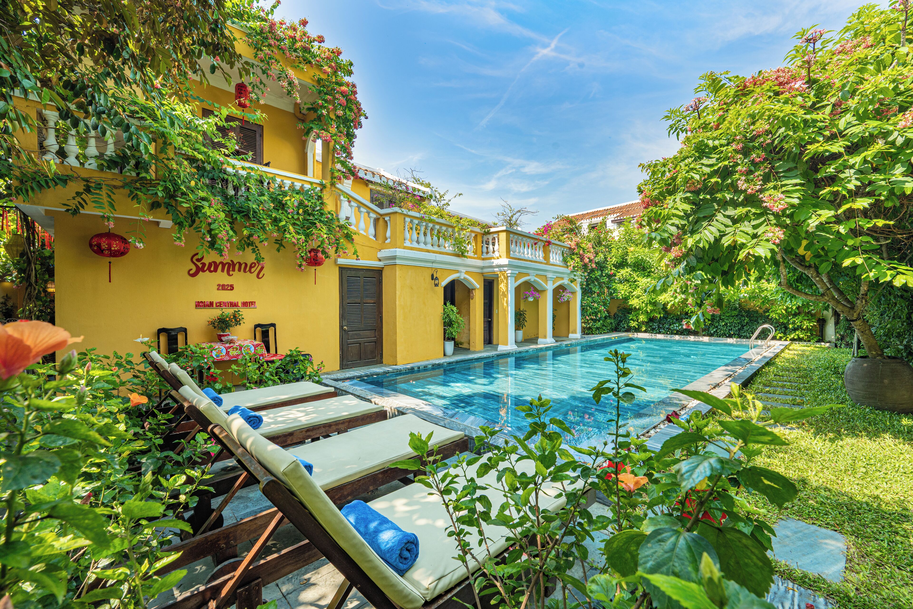 outdoor pool, pool umbrellas, pool loungers