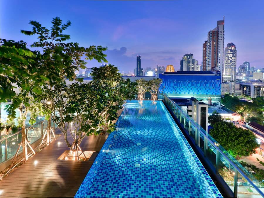 Outdoor pool, open 5:00 AM to 11:00 PM, pool loungers