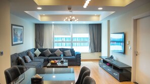 Apartment, 3 Bedrooms | Living area | Flat-screen TV - Centaurus Suites (Islamabad)