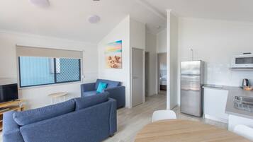 Two Bedroom Cabin | Living area | Flat-screen TV, DVD player