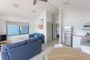Two Bedroom Cabin | Living area | Flat-screen TV, DVD player - Jacobs Well Tourist Park (Jacobs Well)