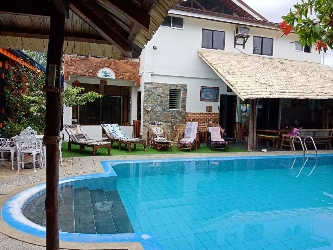 outdoor pool, open 7 am to midnight, pool umbrellas, pool loungers