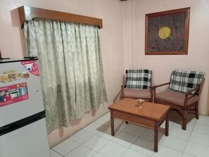 Deluxe-Suite, 1 Schlafzimmer, Nichtraucher, Parkblick | Bügeleisen/Bügelbrett, kostenloses WLAN, Bettwäsche