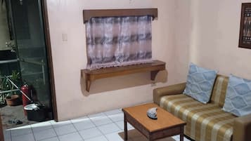 Habitación familiar | Zona de estar | Una televisión de pantalla plana
