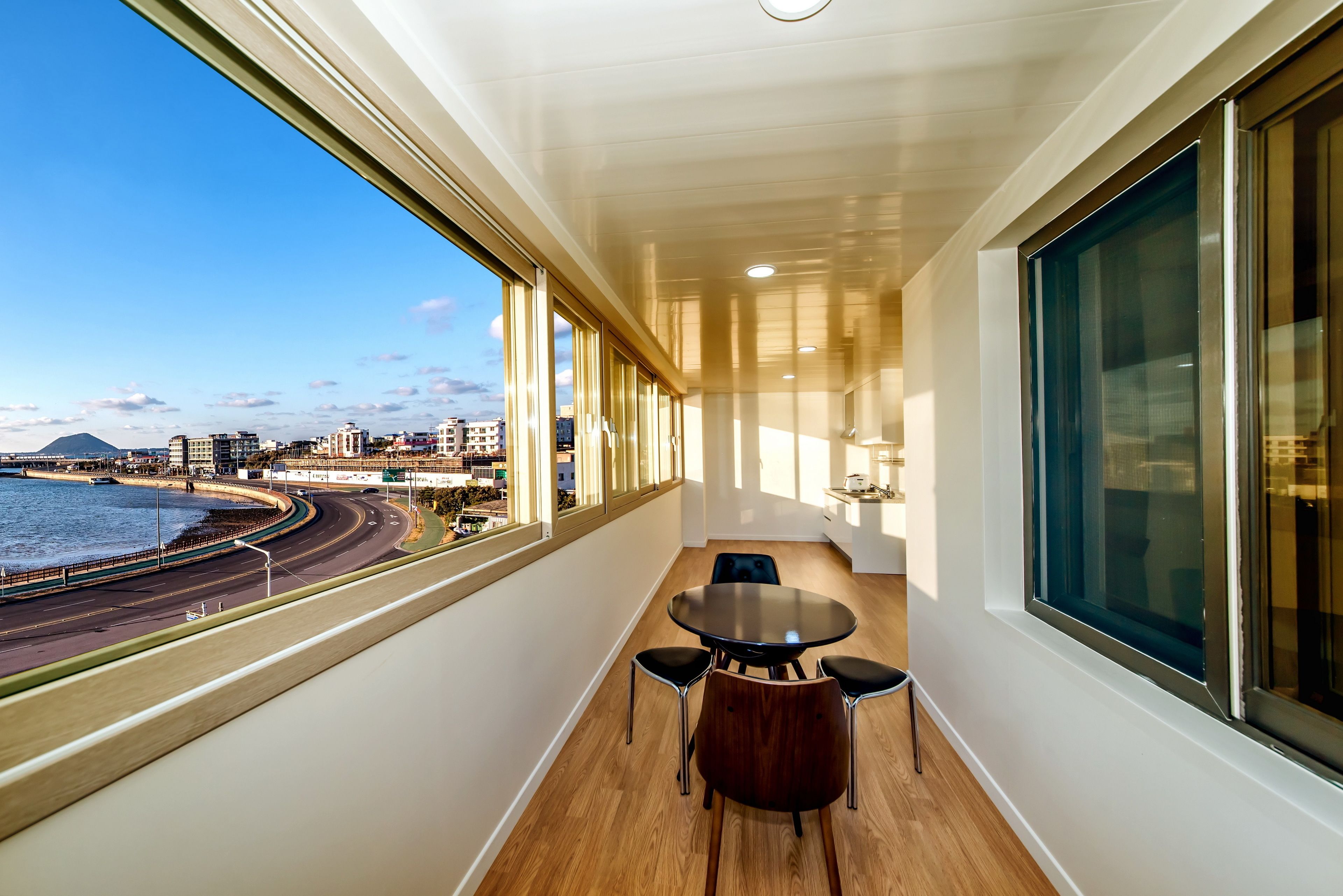 family room, ocean view | in-room dining