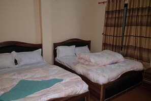 Deluxe Room | Desk, iron/ironing board, free WiFi - President Hotel Lumbini (Lumbini)