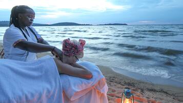 Guests can enjoy a soothing massage on the beach, surrounded by the calming sounds of the sea.