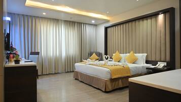 Grand Suite, Bathtub, City View | Minibar, in-room safe, desk, iron/ironing board