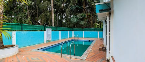 Outdoor pool, open 8:00 AM to 8:00 PM, pool umbrellas, sun loungers