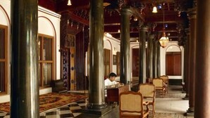 A spacious lobby with high ceilings, large columns, and patterned flooring. - Chidambara Vilas - A Luxury Heritage Resort (Thirumayam)