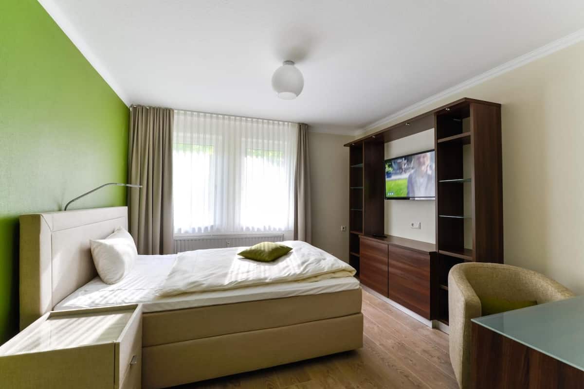 desk, blackout curtains, soundproofing, iron/ironing board