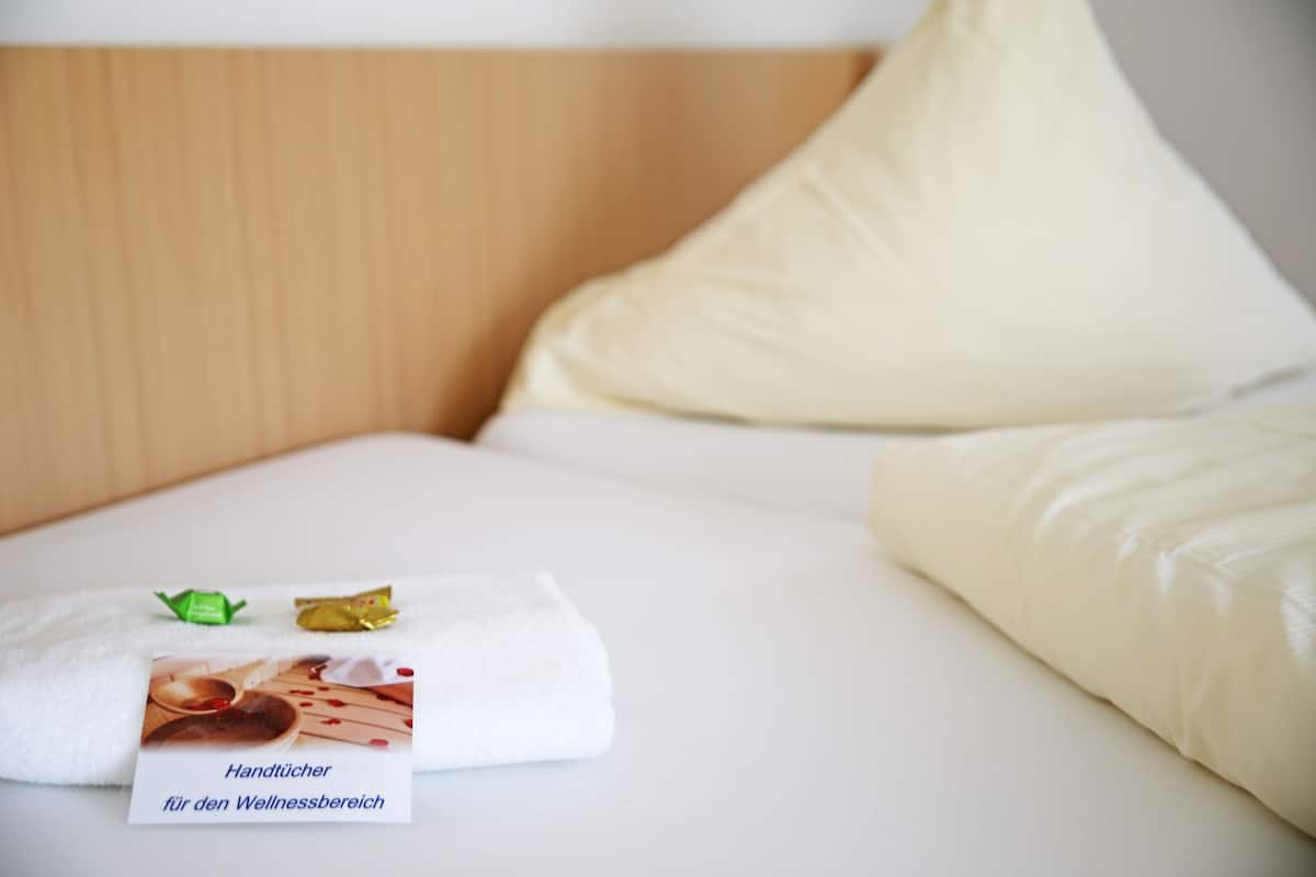 comfort single room | premium bedding, in-room safe, desk, blackout curtains