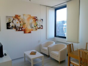 Superior Apartment, 1 Bedroom | Living area | TV