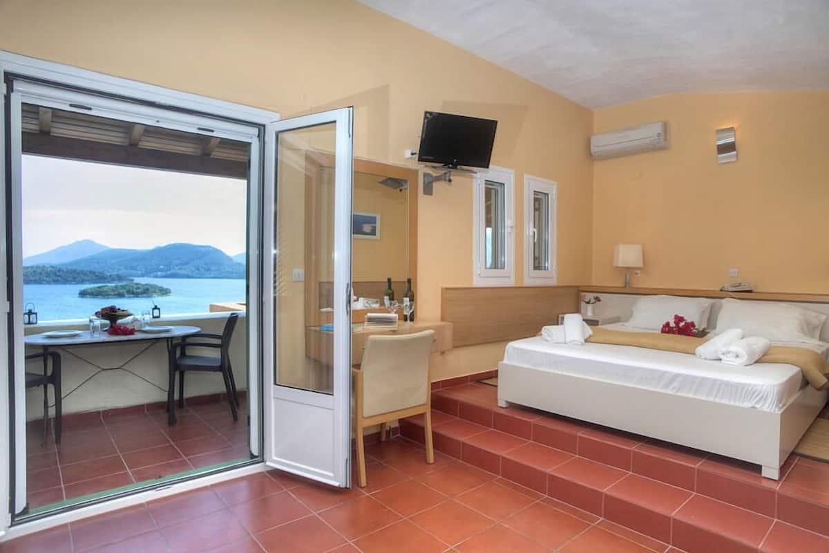 Studio, Sea View | Living area | TV