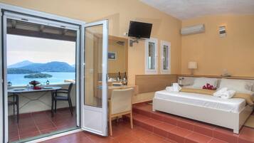 Studio, Sea View | Living area | TV