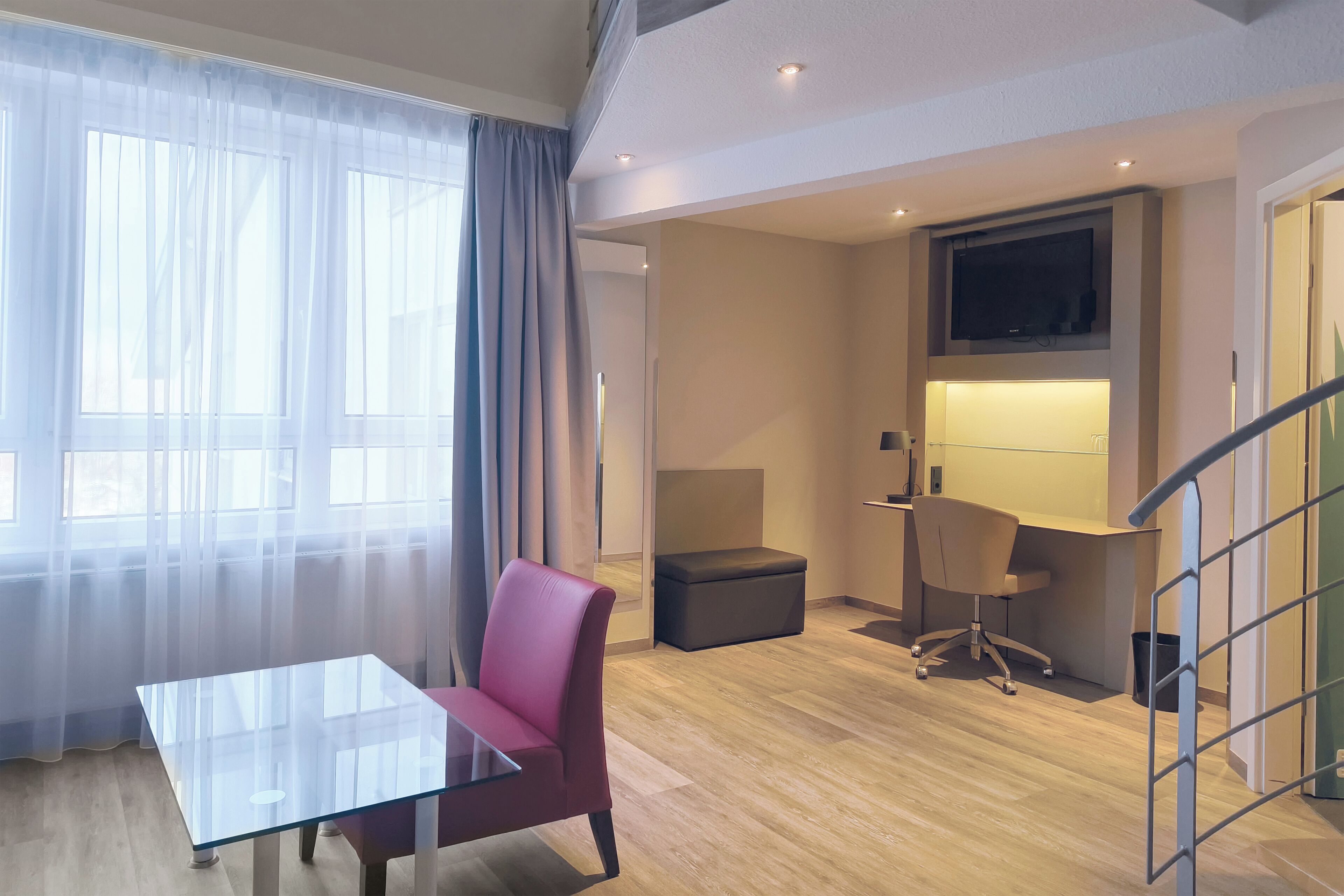 Family Loft, 1 Bedroom (Living Area) | Hypo-allergenic bedding, in-room safe, desk, soundproofing