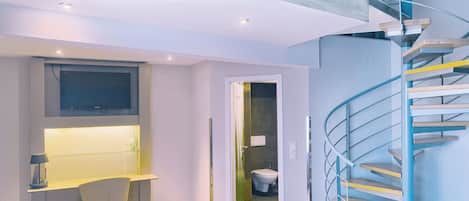 Loft, 1 Bedroom (Living Area) | Bathroom | Shower, free toiletries, hair dryer, towels