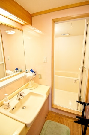 A bathroom with a sink, mirror, and shower. - Yura No Yado SEIFUEN (Achi)