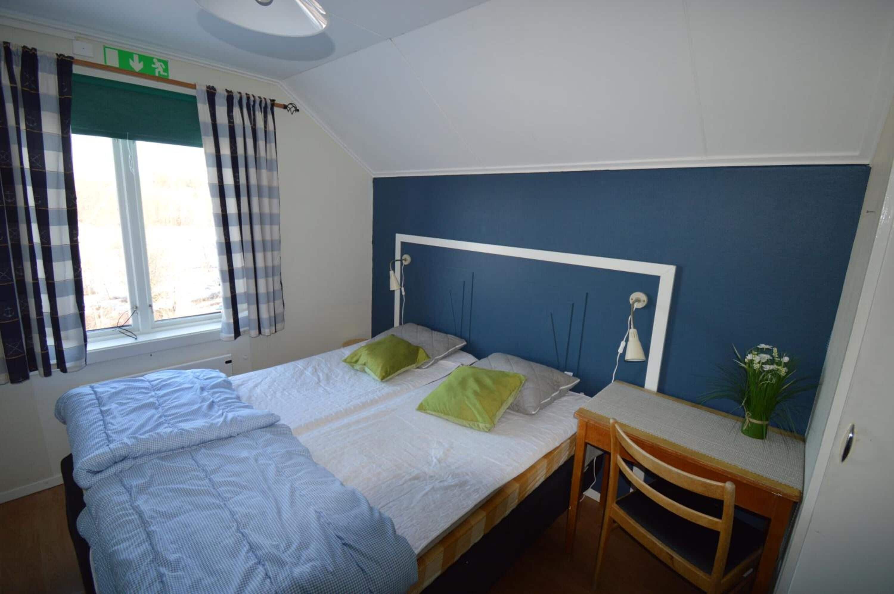 Double Room | Desk, blackout drapes, iron/ironing board, free WiFi
