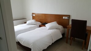 Twin Room | Blackout drapes, free cribs/infant beds, rollaway beds, free WiFi - Hotel Lutece (Rabat)
