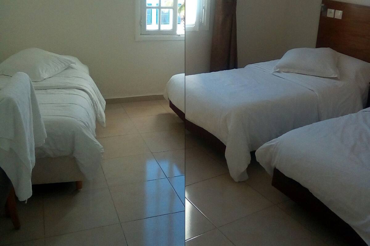 Triple Room | Blackout drapes, cribs (free), rollaway beds (surcharge), WiFi (free)