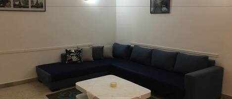 Basic Apartment, 2 Bedrooms | Living room | 40-inch flat-screen TV with satellite channels, TV