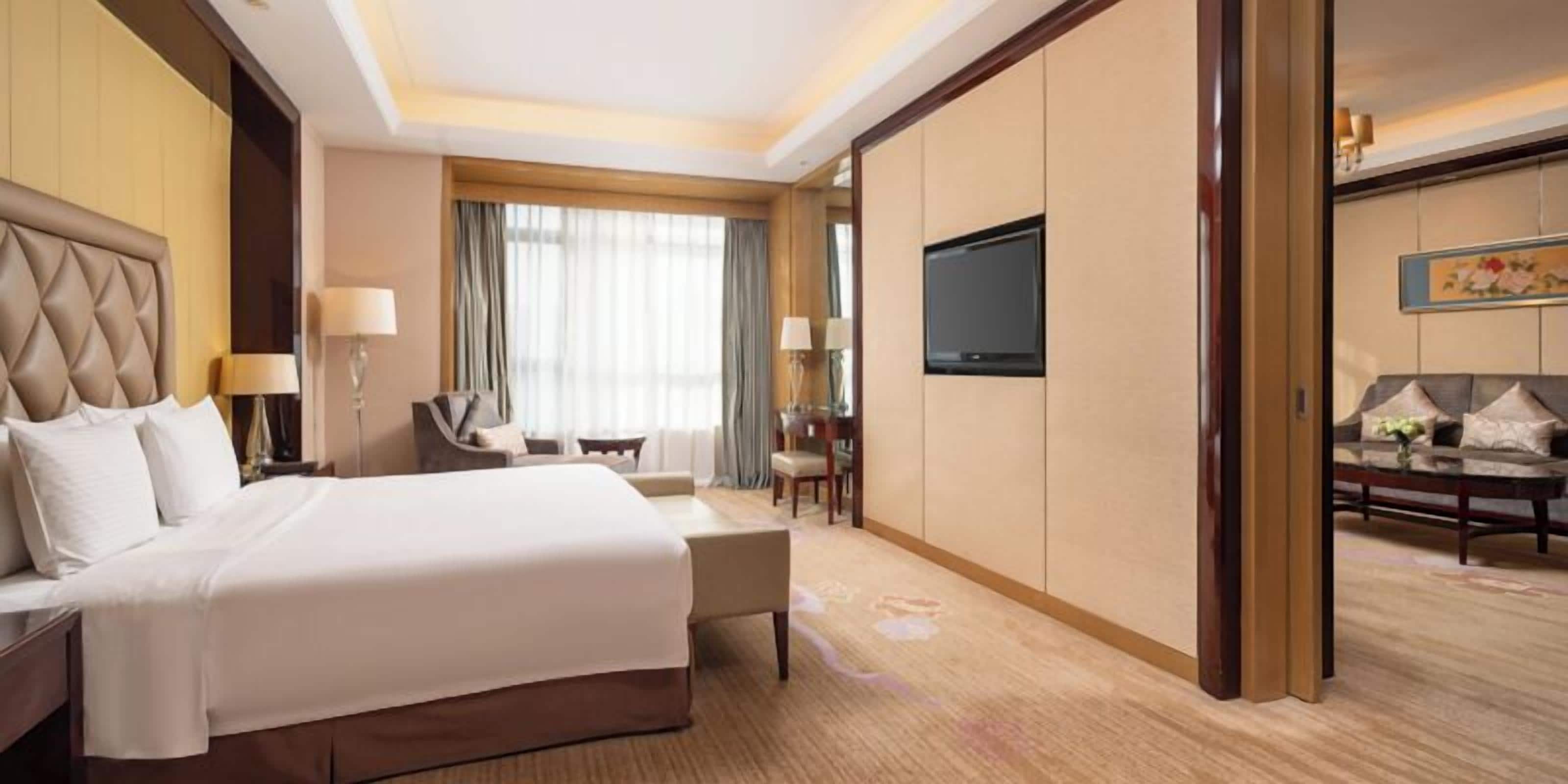 Suite Deluxe | Ropa de cama de alta calidad y minibar 