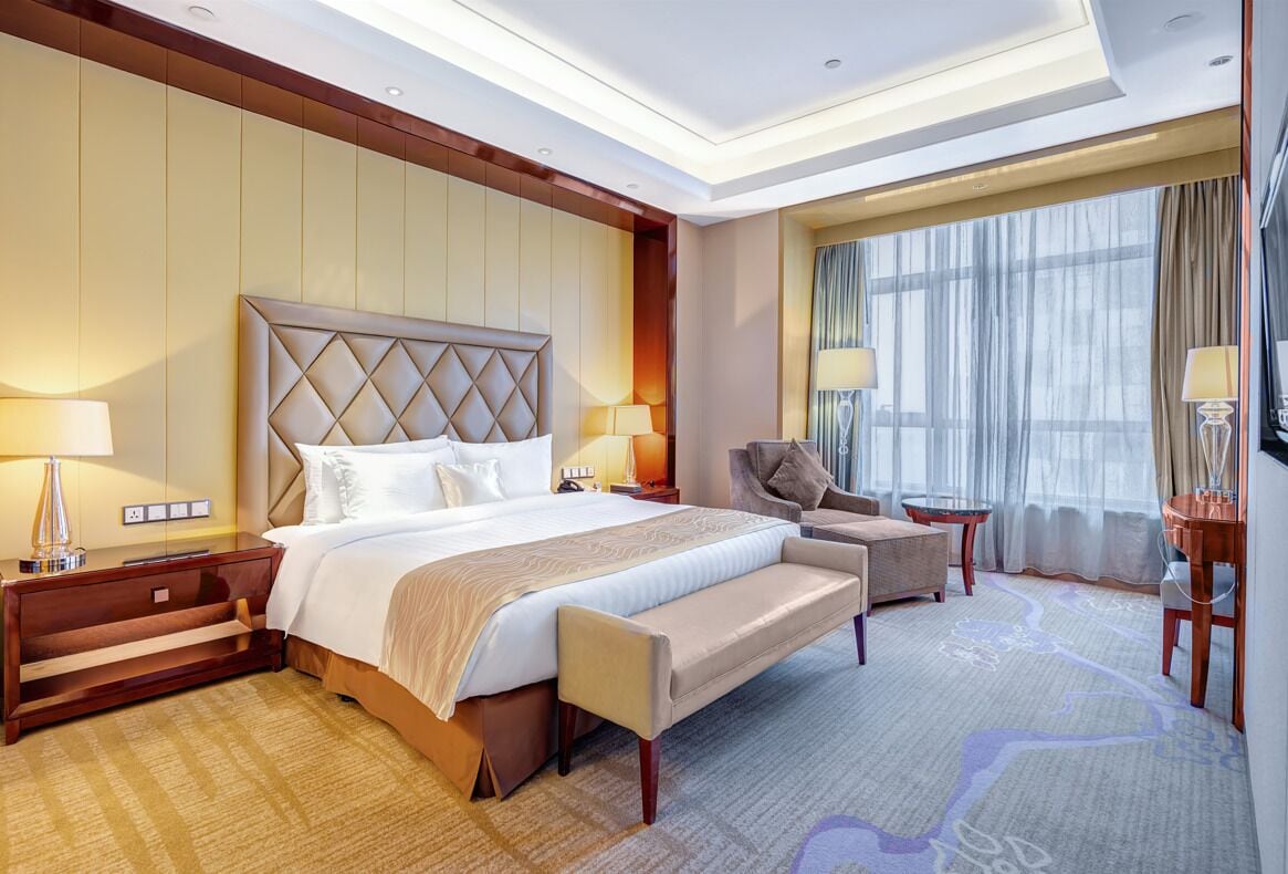 Suite Deluxe | Ropa de cama de alta calidad, minibar, caja fuerte y escritorio