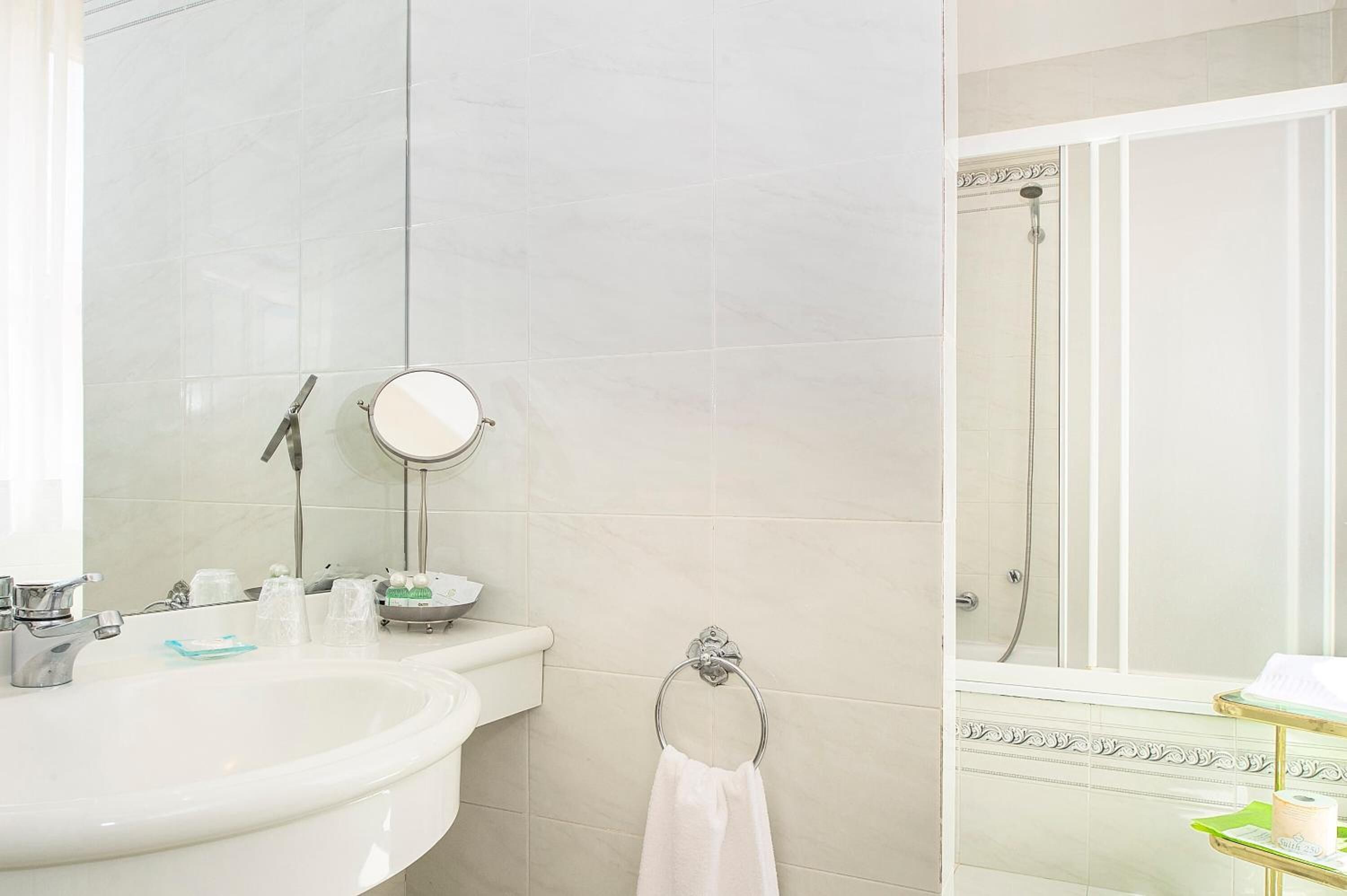 free toiletries, hair dryer, bidet, towels