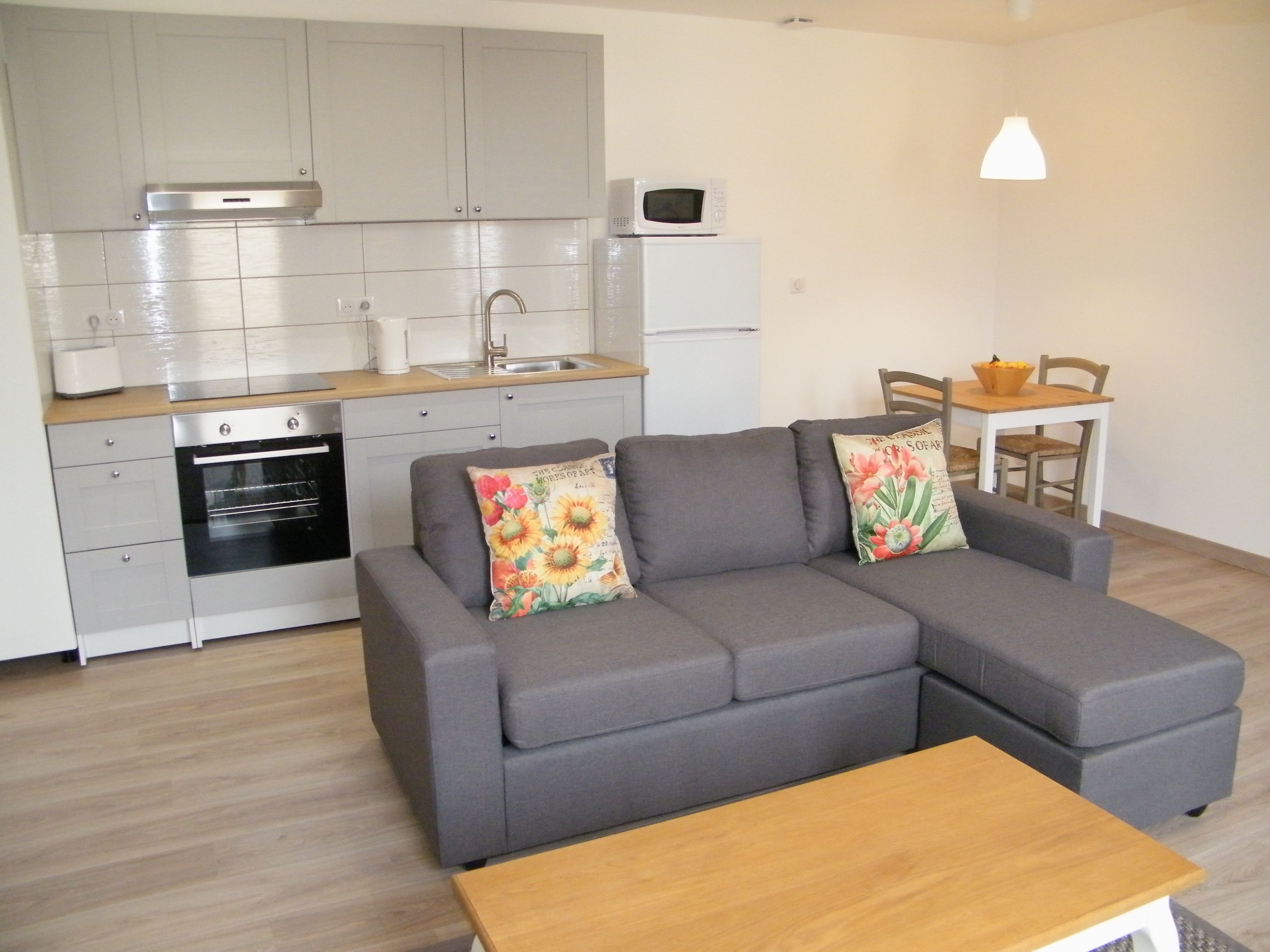 Cottage (2. The Courtyard) | Living area | Flat-screen TV