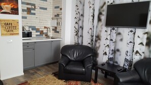 Comfort Apartment, 2 Bedrooms, Kitchen, City View | Living area | Flat-screen TV - Eftimiu Luxury Apartment (Bucharest)