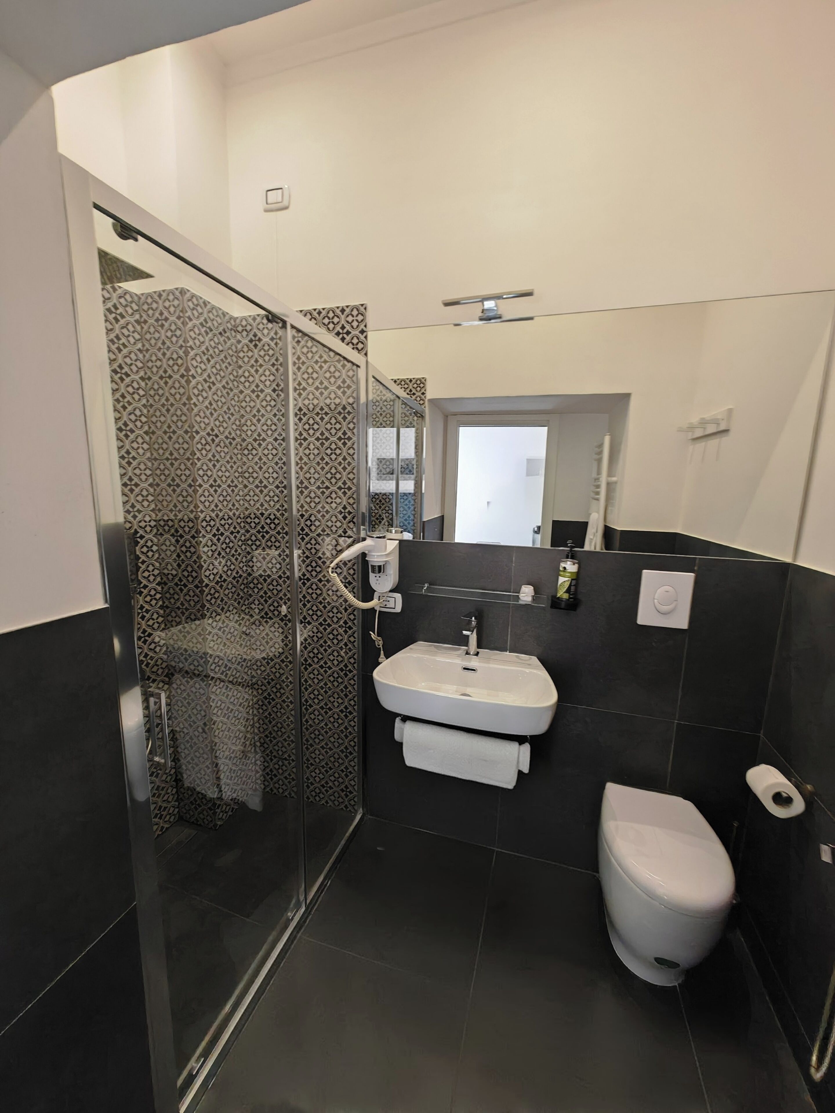 classic triple room | bathroom | shower, rainfall showerhead, free toiletries, hair dryer