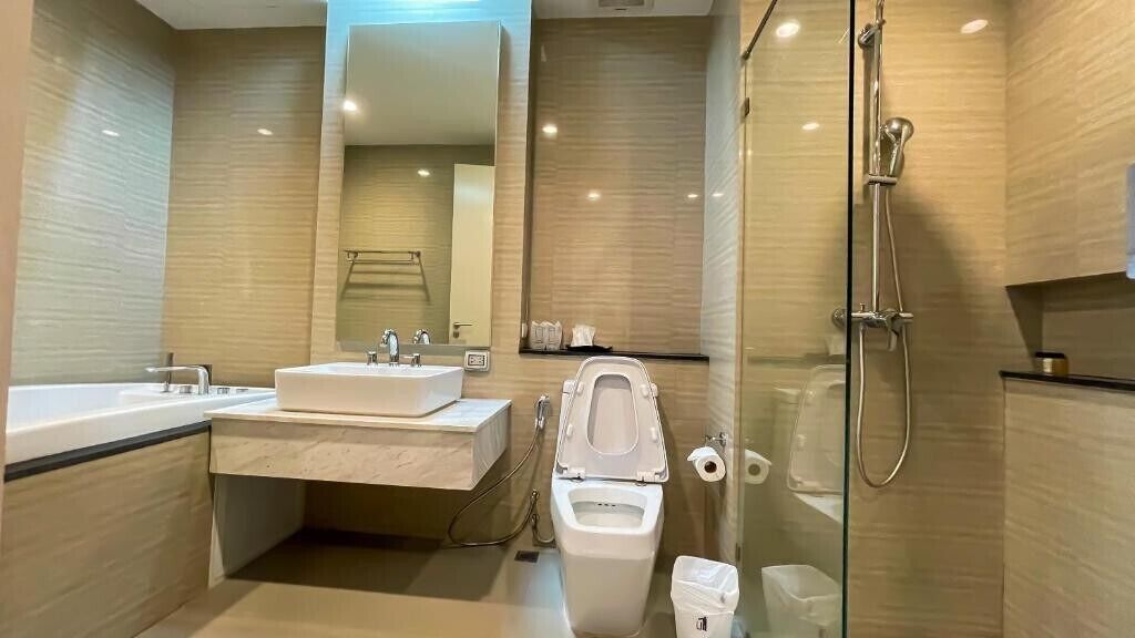 superior twin beds (bathtub) | bathroom | free toiletries, hair dryer, bathrobes, slippers