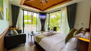 Villa, vista al jardín | Ropa de cama de alta calidad y minibar